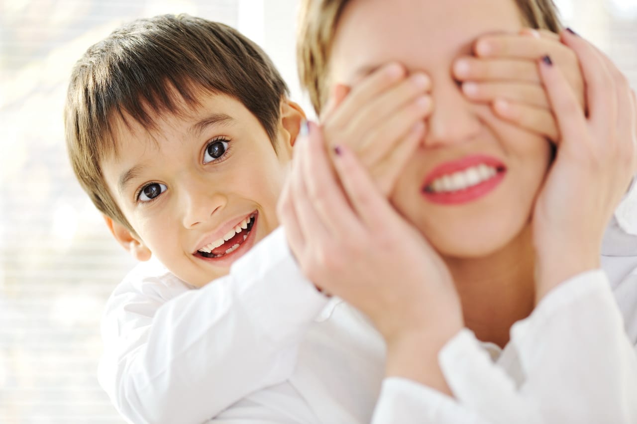 Family Portrait Of Mother And Son At Home